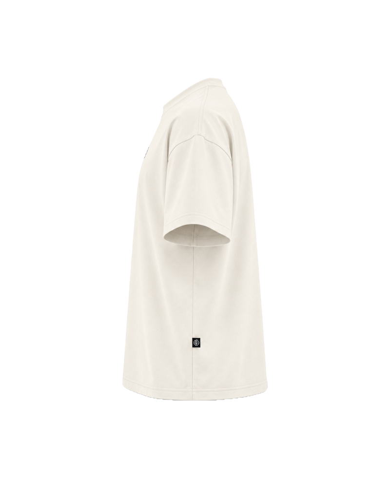 Ivory Ghoolf mock neck tee, side view, with dropped shoulder and woven tab at the side seam