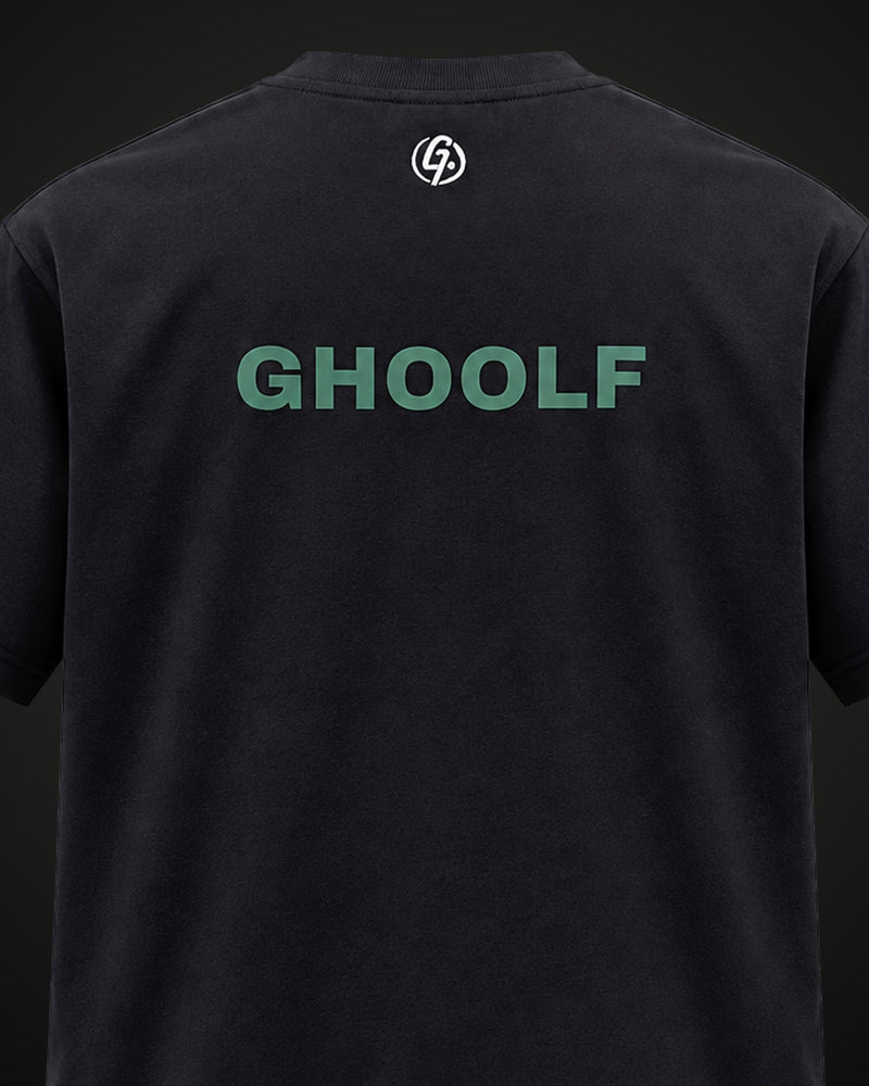 Back of the black mock neck tee, close up, with white signet below the collar and forest green Ghoolf wordmark