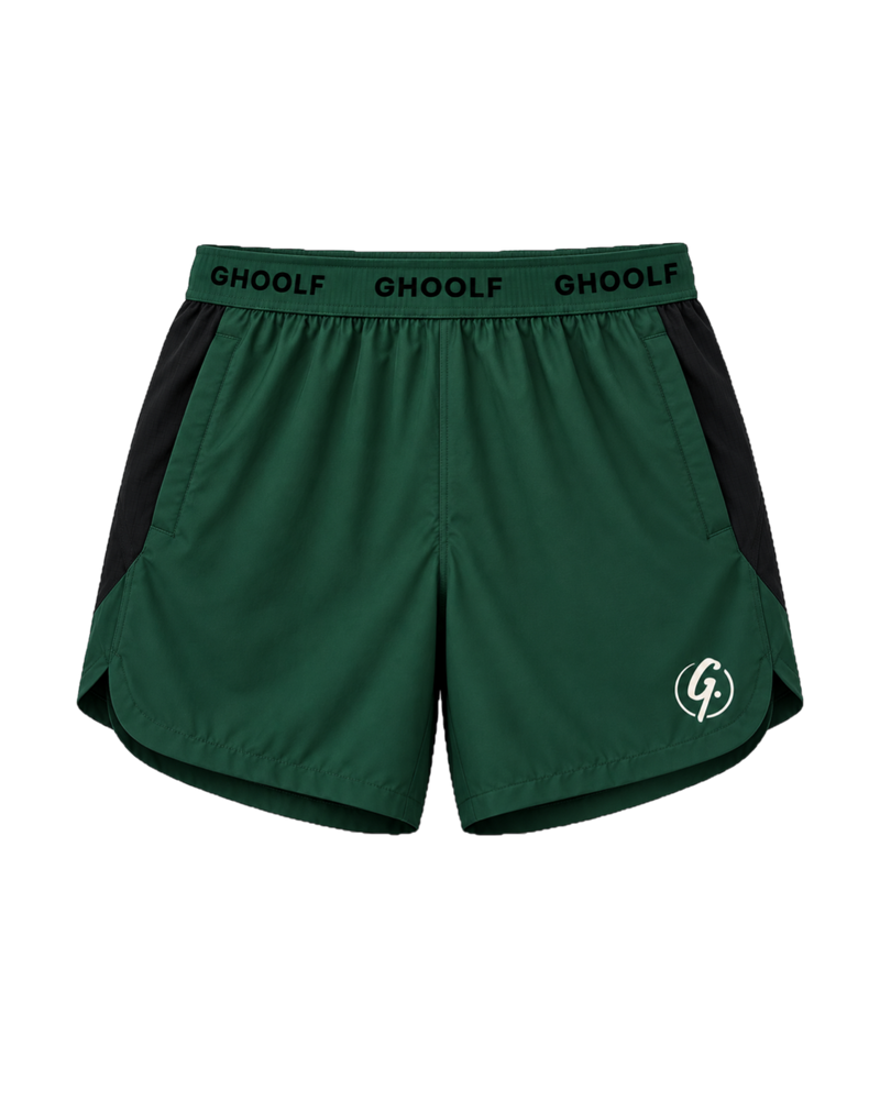 Forest green Ghoolf sport shorts with black side panels, front, with wordmark waistband and signet at the hem