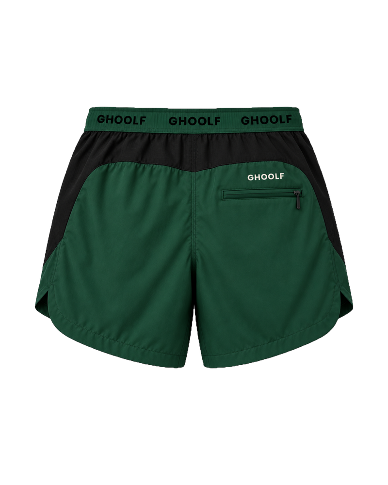 Forest green Ghoolf sport shorts with black side panels, back, with zip pocket and wordmark waistband