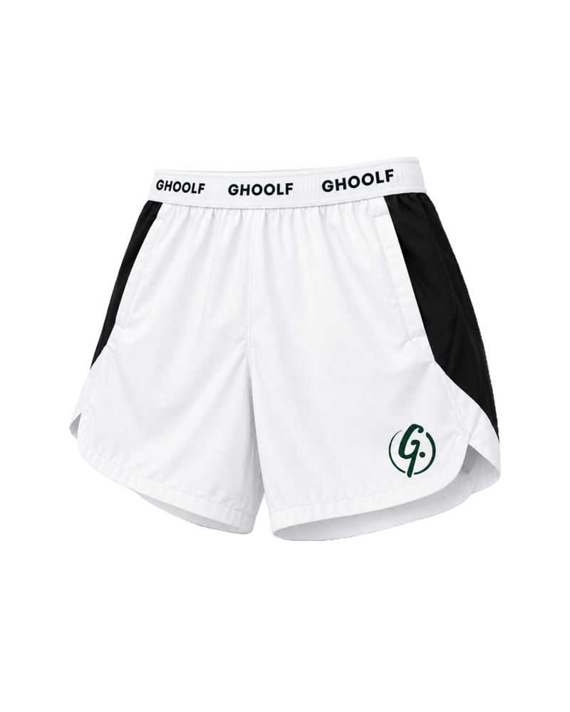 White Ghoolf sport shorts with black side panels, three-quarter view, with split curved hem