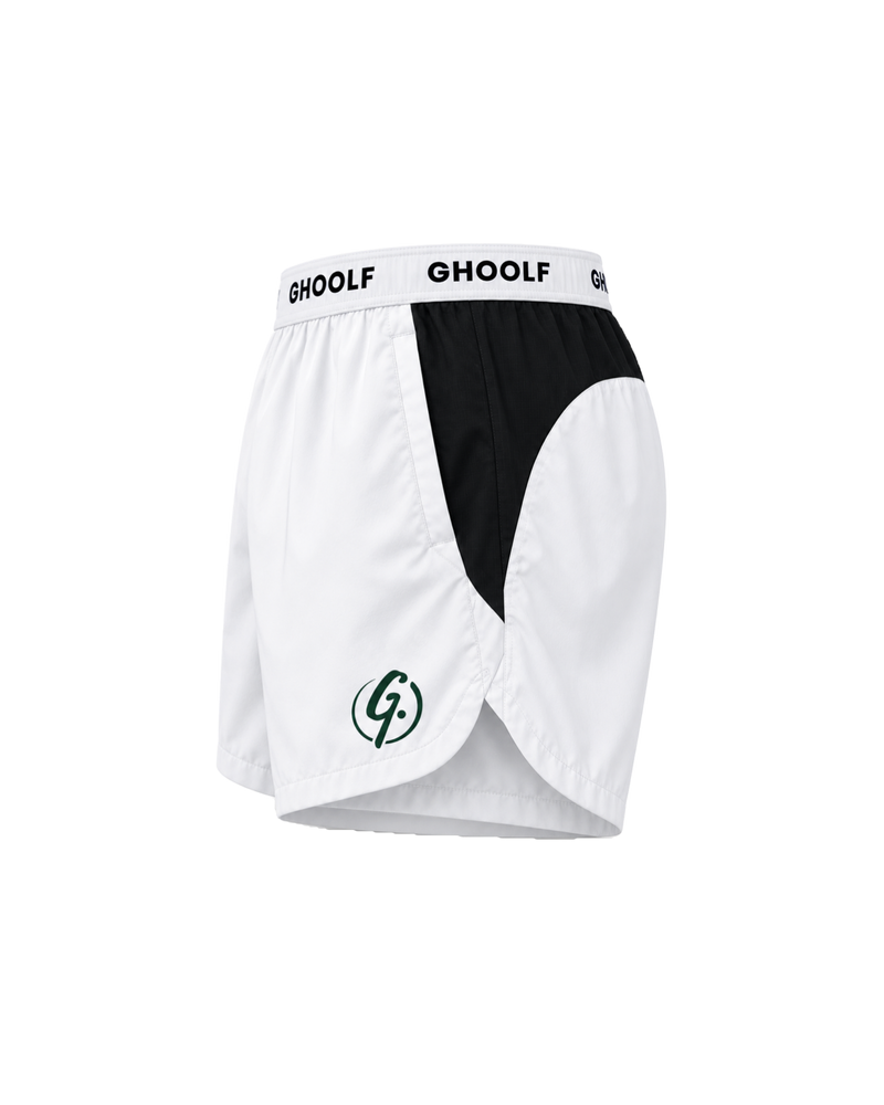 White Ghoolf sport shorts with black side panels, side view, with signet at the hem