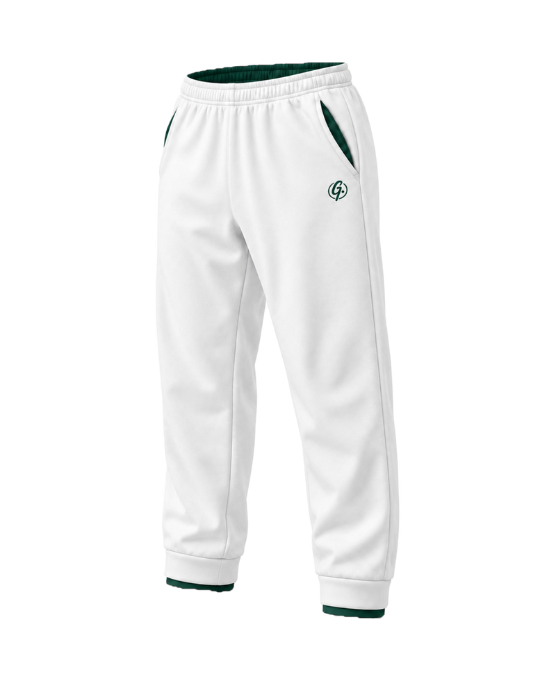 White Ghoolf sweatpants, three-quarter view, with forest green signet at the hip and cuffed hem