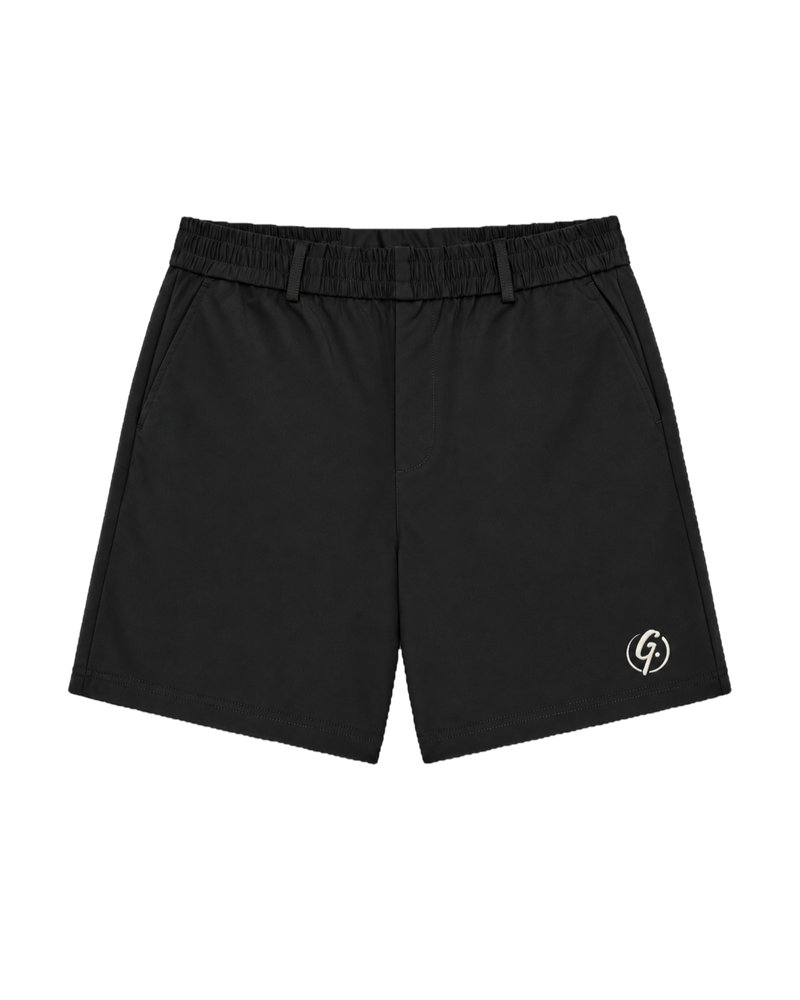 Black Ghoolf tailored shorts, front, with belt loops and ivory signet at the hem